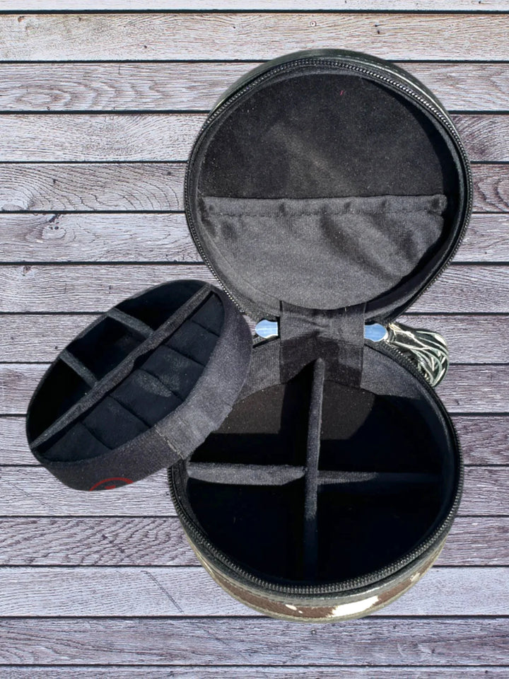 Open top view round black cowhide jewelry box