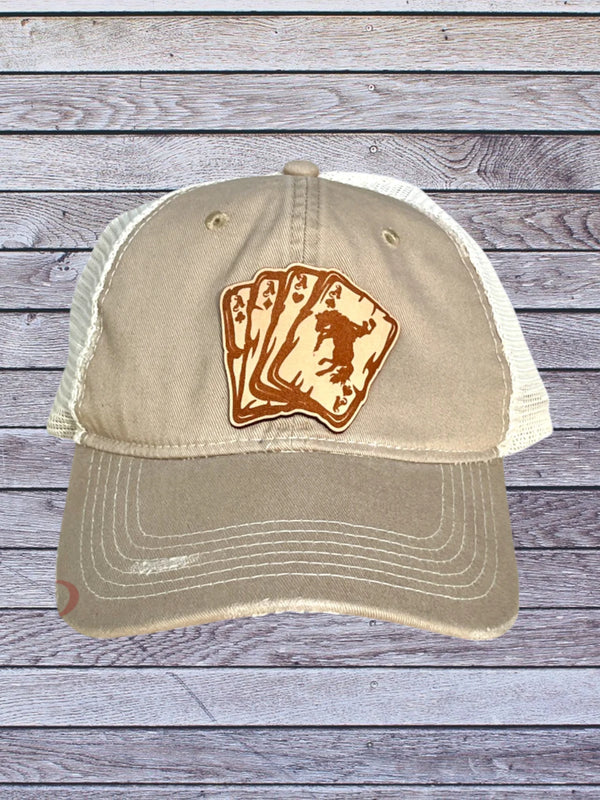 Ball cap with leather hat patch featuring Aces with bronc rider 