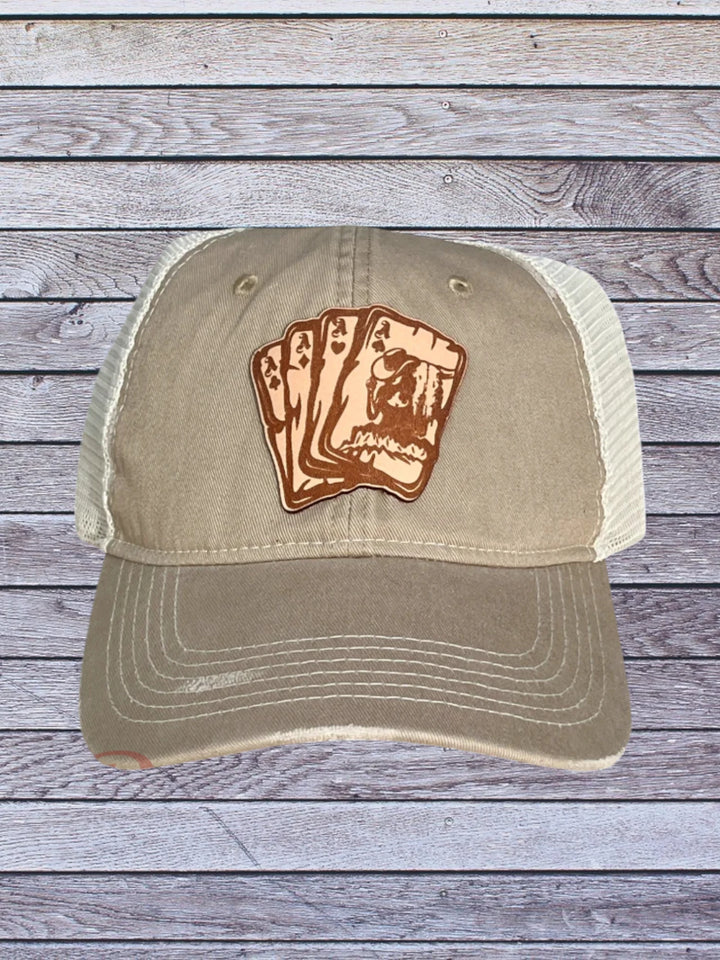 Tan Ball cap with leather hat patch featuring Aces with cowgirl 