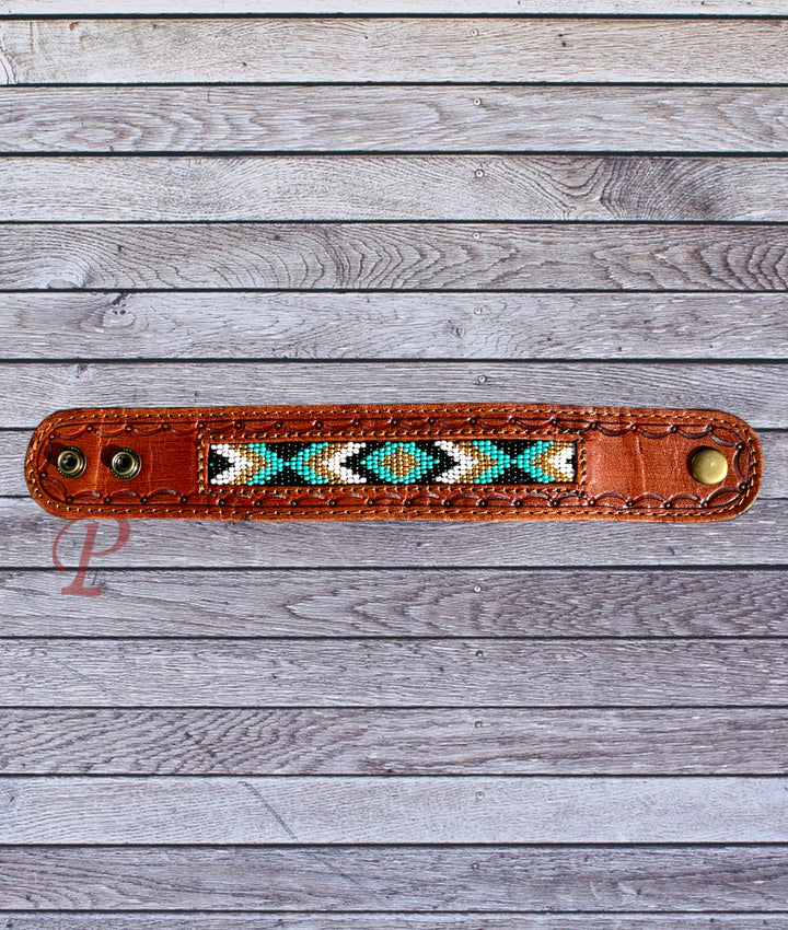 leather bracelet with teal and black beading