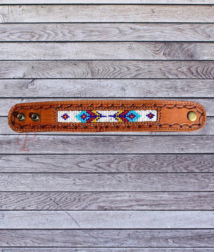 leather bracelet with white and red beading