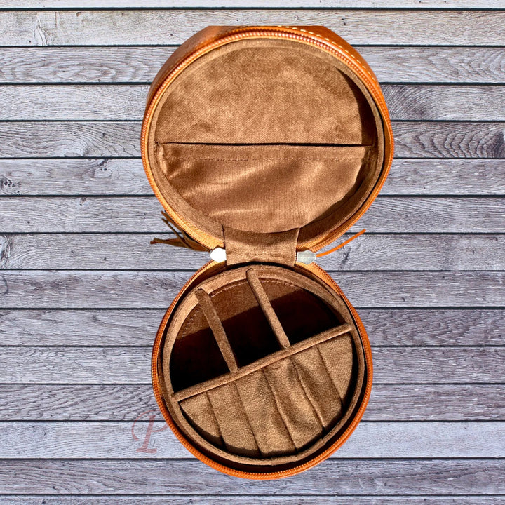 top view round brown cowhide jewelry box opened